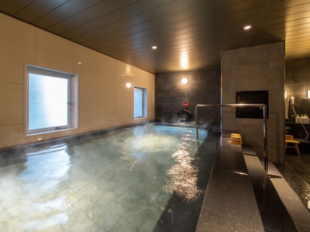 スーパーホテル新横浜(SUPER HOTEL SHINYOKOHAMA)ー大浴場（高濃度炭酸泉　ハナミズキの湯）＊公式サイトより